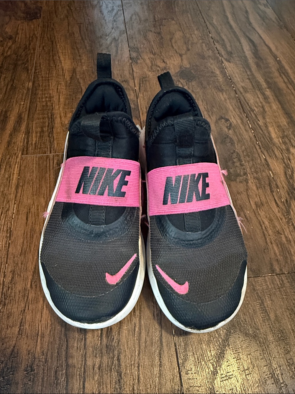 Nike Kids Black Slip-On Sneakers with Pink Straps